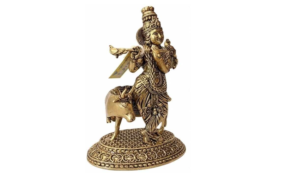 Krishna with cow idol