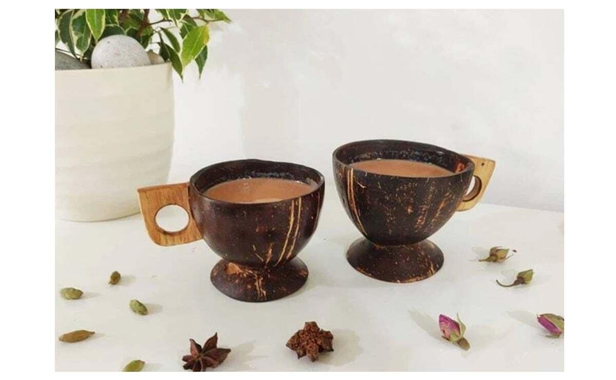 The Natural Coconut Shell Cup with Handle is an eco-friendly, reusable drinking cup perfect for tea, coffee, and juices. - Image 4